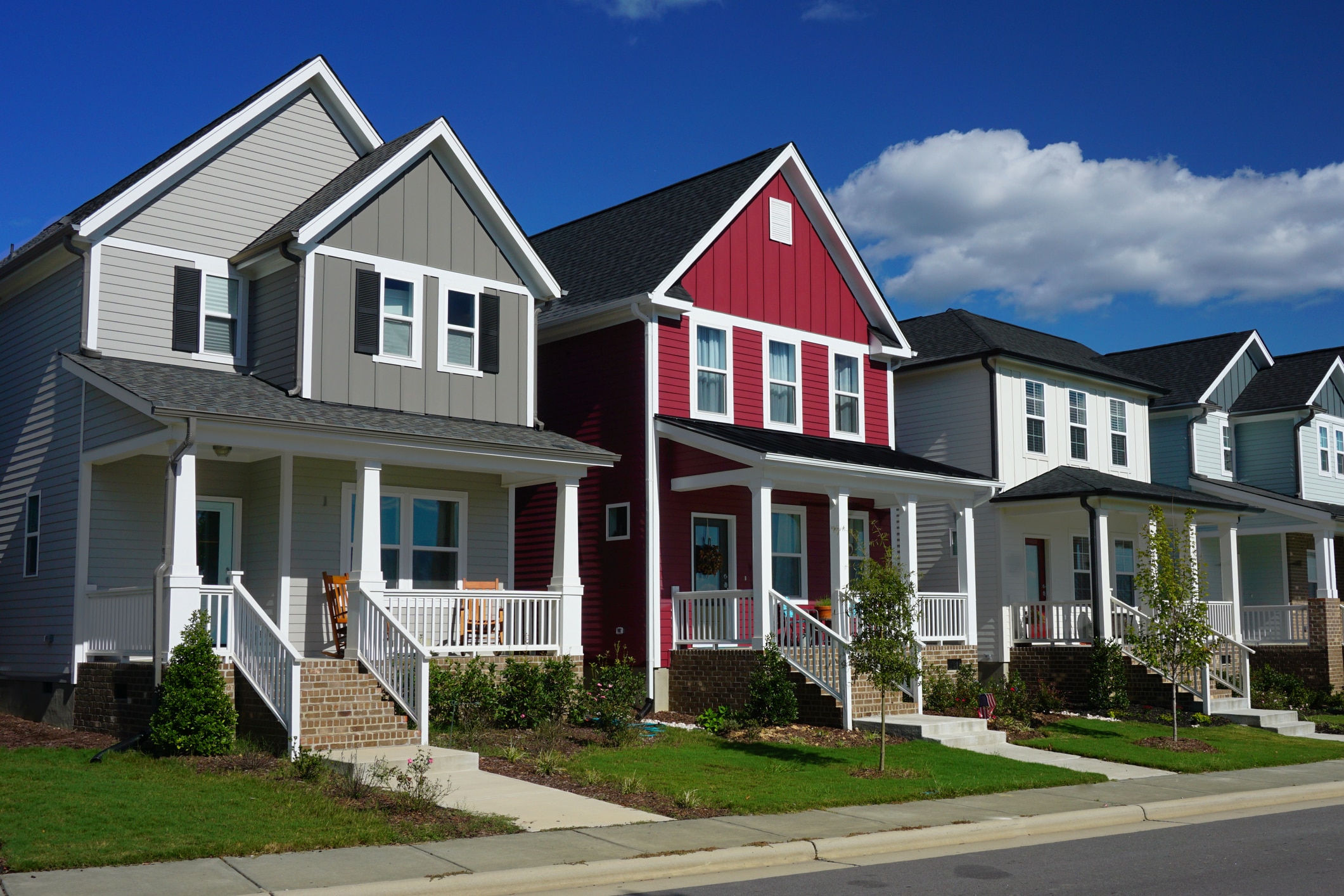 Red and Gray Row Houses in Suburbia stock photo
